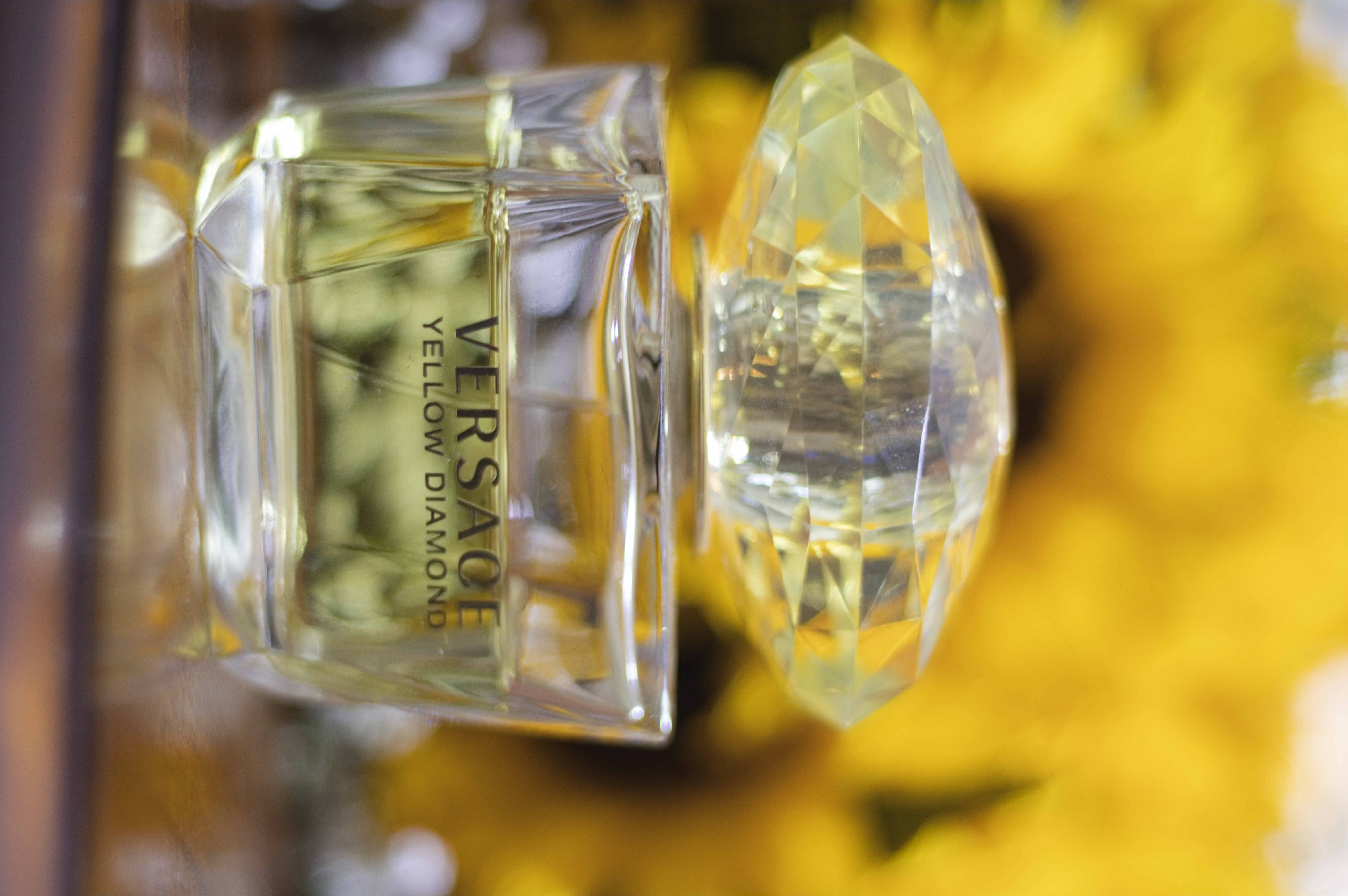 Bridal perfume bottle against golden sunflowers